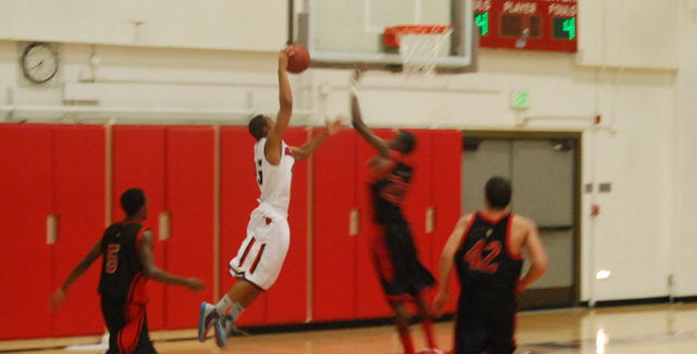 Isaiah Chennault goes up for a dunk in the Dons 84-79 win over Long Beach City College.