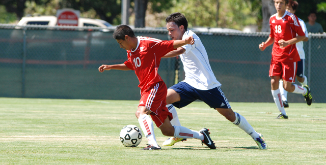 Amos De La Paz controls the ball against a San Diego Mesa defender. De La Paz had one of the goals in the Dons 6-0 win.