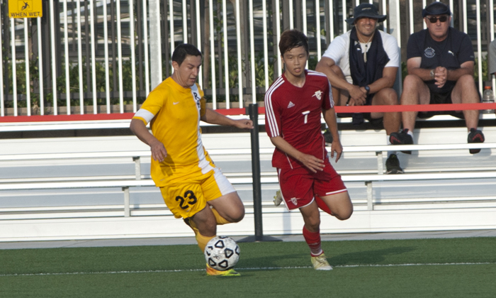 Dong Beom Seo battles a Rio Hondo player near midfield for the ball. Seo scored the Dons lone goal in their 2-1 loss to the Roadrunners.