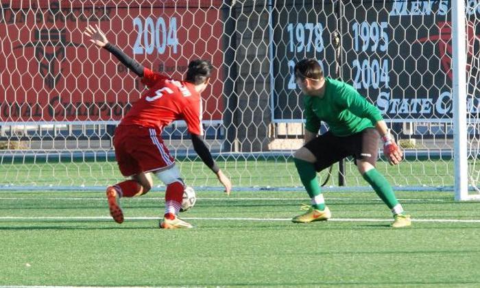 Jangho Yoon beats the Norco goalkeeper to a loose ball for the final goal of the Dons 5-2 victory.