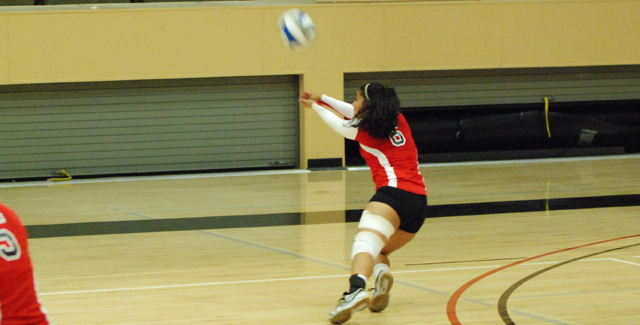 Alejandrina Alejandro digs a ball in the Dons season opening match against San Diego City College.