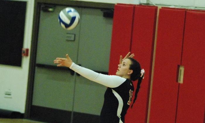 Madison Logan serves in the Dons Orange Empire Conference opener against Irvine Valley College.