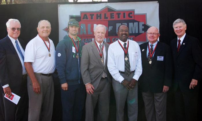 From left to right: Chairman of the Athletic Hall of Fame Ken Purcell, inductees Dave Ogas, CJ Wilson, Don Sneddon, Eddie Steward and William Delaney, Master of Ceremonies Ed Arnold.