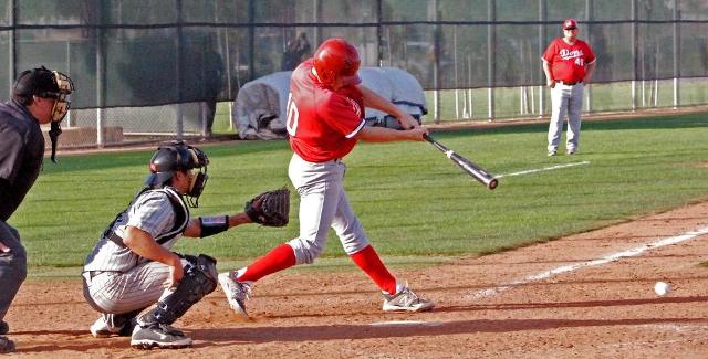 Garret Brown drives a ball through the right side to score Troy Baird in the Dons 4-3 loss to Cerritos College. Brown finished 2-for-2 with two RBI in the game.