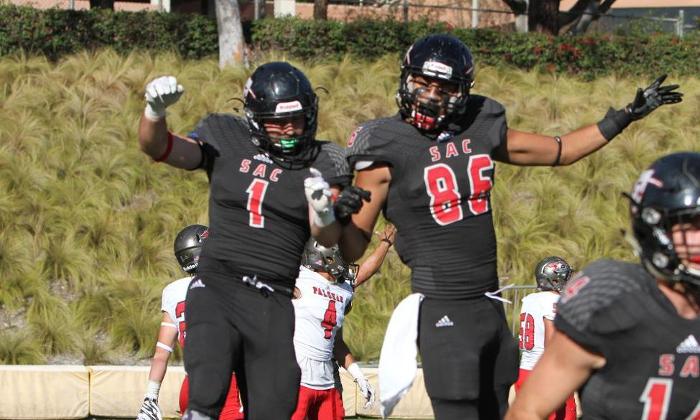 Anthony Piscitelli (left) and Dorion Barnett celebrate following Piscitelli's touchdown catch against Palomar College. Barnett also had a touchdown reception in the game. Photo courtesy of Tony McAndrew.