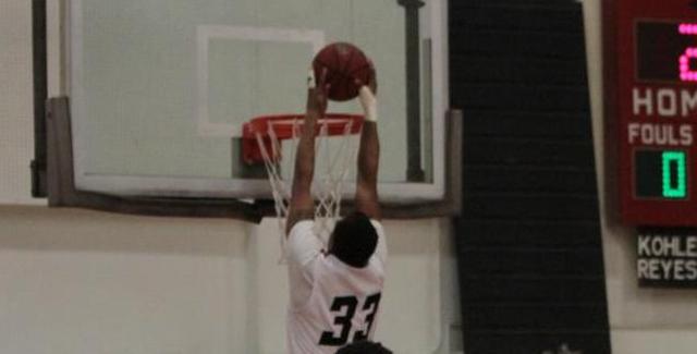 Cameron Hill gets a dunk in the Dons victory over Riverside City College. Photo courtesy of Tony McAndrew.