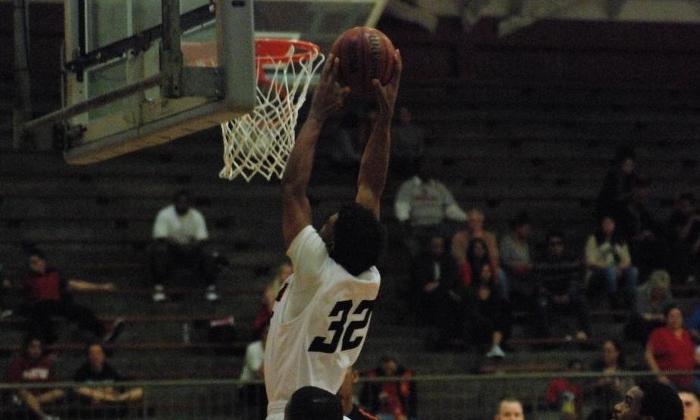 De'Jon Frazier dunks the ball in the Dons final game of the season.