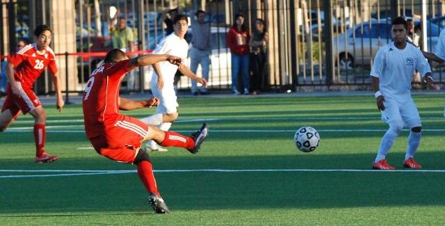 Luis Venegas sends a shot in on a free kick in the Dons 3-3 tie with Fullerton College. Venegas scored all three goals for the Dons.