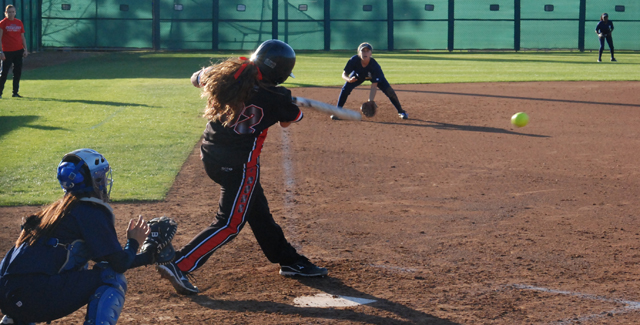 Chantal Oelrich drives a ball up in the middle in the Dons game against San Diego Mesa College.