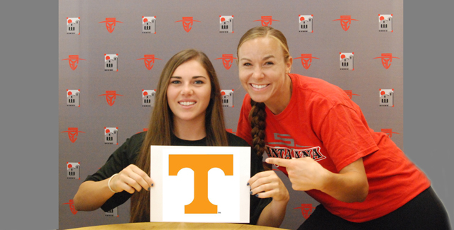 Alexandra Perkins (left) shows off the University of Tennessee 'T' after signing her National Letter of Intent. She is joined by Dons Head Coach Jessica Rapoza.