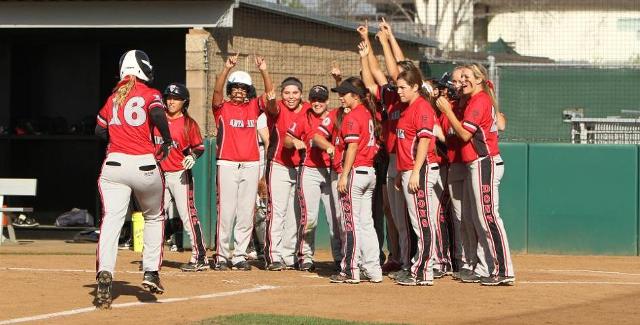 The Dons wait at home plate to celebrate after Heather Robertson's (16) three-run home run to end the game against Orange Coast College. (Photo courtesy of Tony McAndrew)