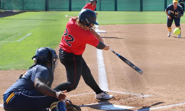 Christina McCullogh scored Tina Ramos on this hit as she went 3-for-3 against Fullerton College.