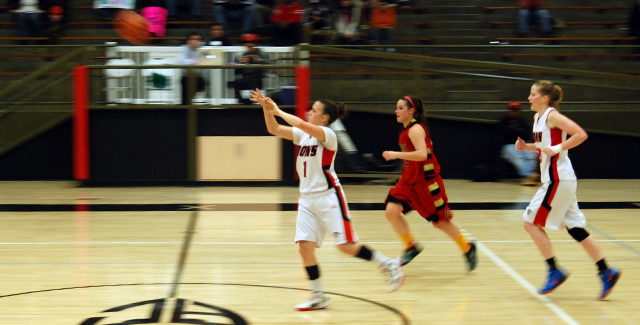 Ashley Whisler sends a pass to a teammate in the Dons 60-55 win over Desert to open the SAC Tournament.