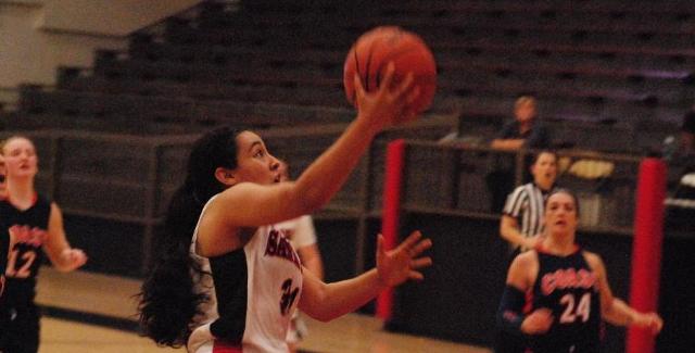 Alysia Gamboa lays in a basket in the Dons 76-59 win over Orange Coast College. Gamboa finished with a team-high 20 points.