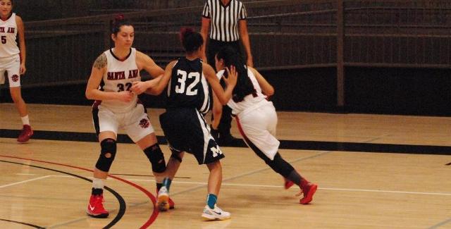 Alysia Gamboa (right) goes around a Kylie Rodriguez screen in the Dons OT win over San Diego Mesa. Gamboa led the Dons with 17 points and Rodriguez added another 14.