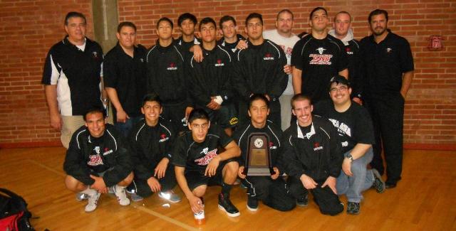 The Dons pose as a team with their trophy following their second place finish at the South State Duals.