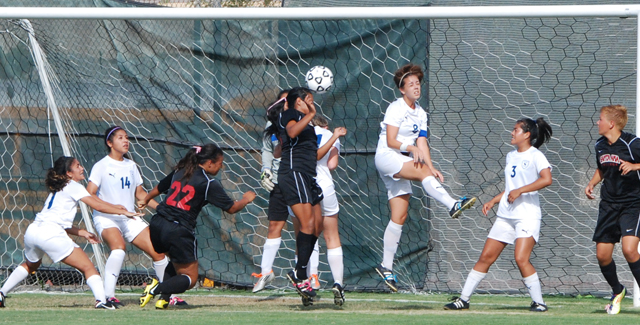 Tiffany Martinez heads in the first of her two goals in the Dons 4-1 win over Irvine Valley College.