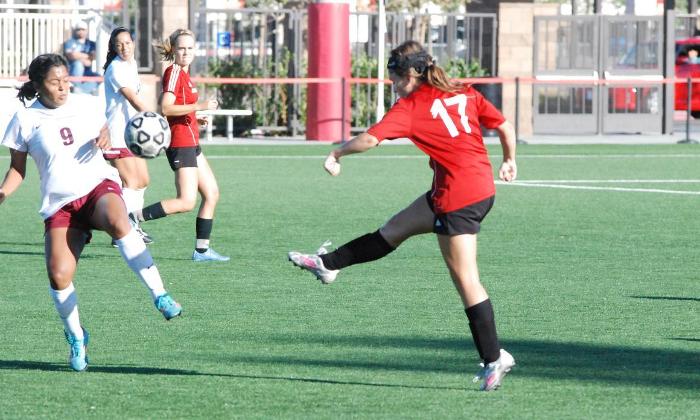 Kelly Hanna clears the ball past a Norco forward in the Dons 4-1 win. Hanna scored the first goal of the match in the 21st minute.