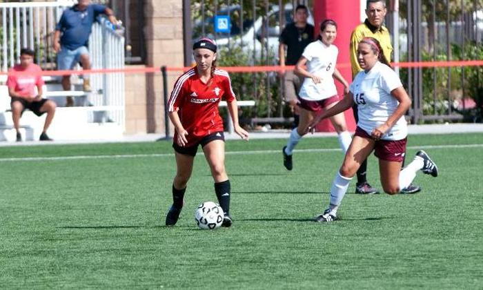 Kacee Thoren controls the ball in front of a Pasadena City defender. Thoren scored the game-winning goal in the Dons 2-1 victory.