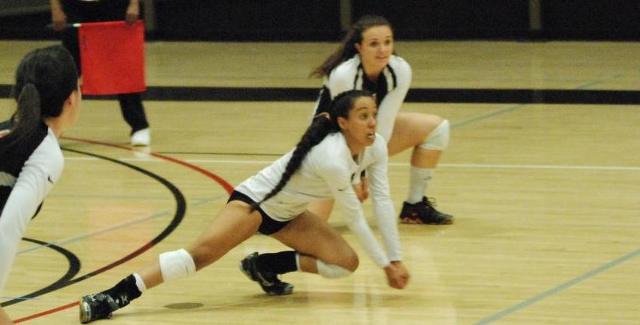 Myriah Kunipo-Aguirre stretches for a dig in the Dons non-conference match against Cal Lutheran.