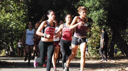 Susana Marquez (left) and Reyna Fonseca (middle) run in the lead pack during the first mile of the Brubaker Invitational.